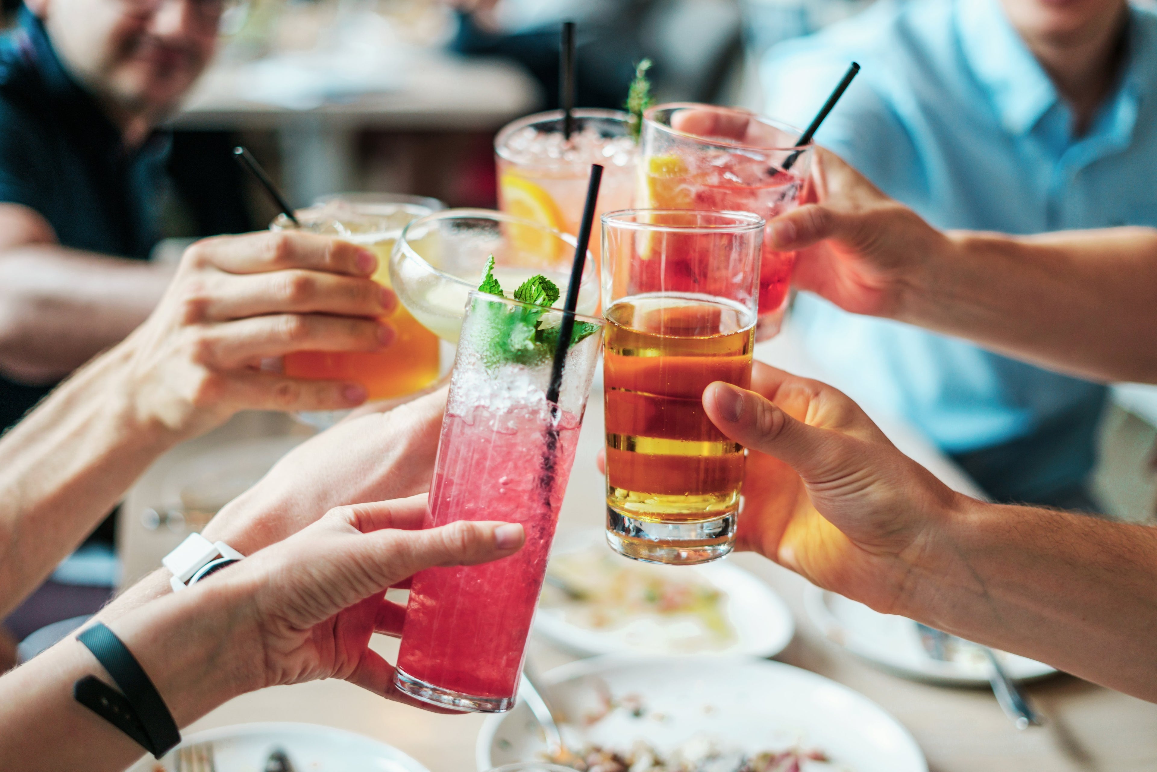 Friends sharing a cocktail